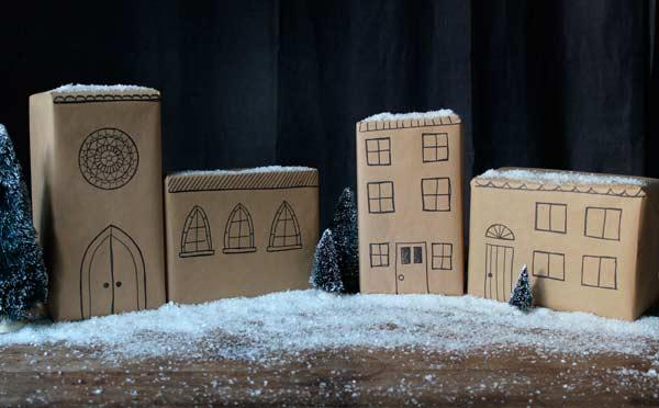 regalos de navidad con papel de regalo decorado en forma de ciudad nevada