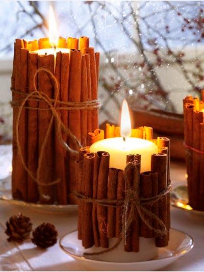 Cirios con ramas de canela para navidad