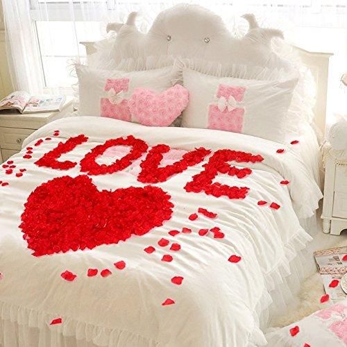 regalar rosas rojas en san valentín, pétalos de rosas rojas