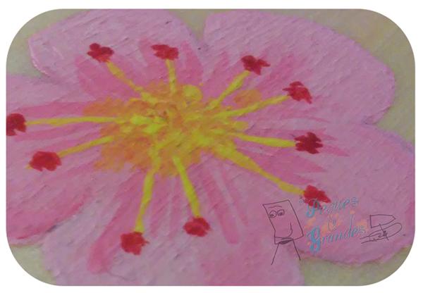 Muñeca oriental sobre tablilla