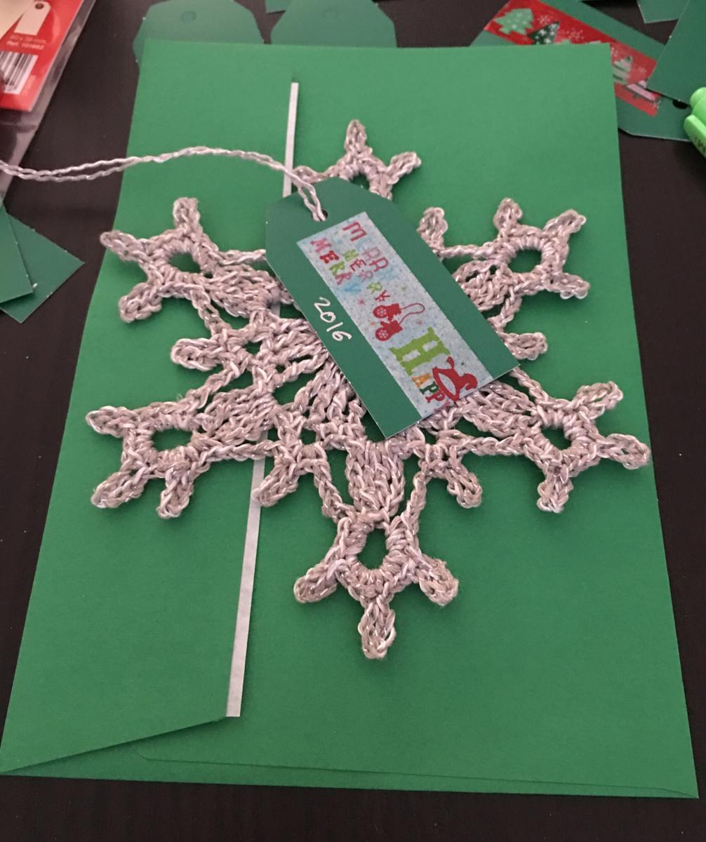 Tarjeta con el copo de nieve