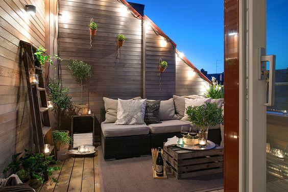 Decorar una terraza con estilo nórdico iluminación nocturna