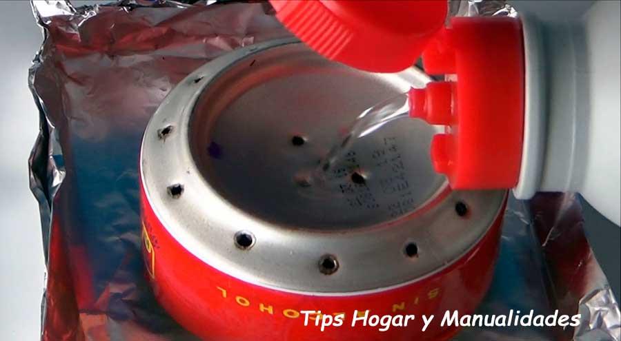 infernillo casero con dos latas de refresco