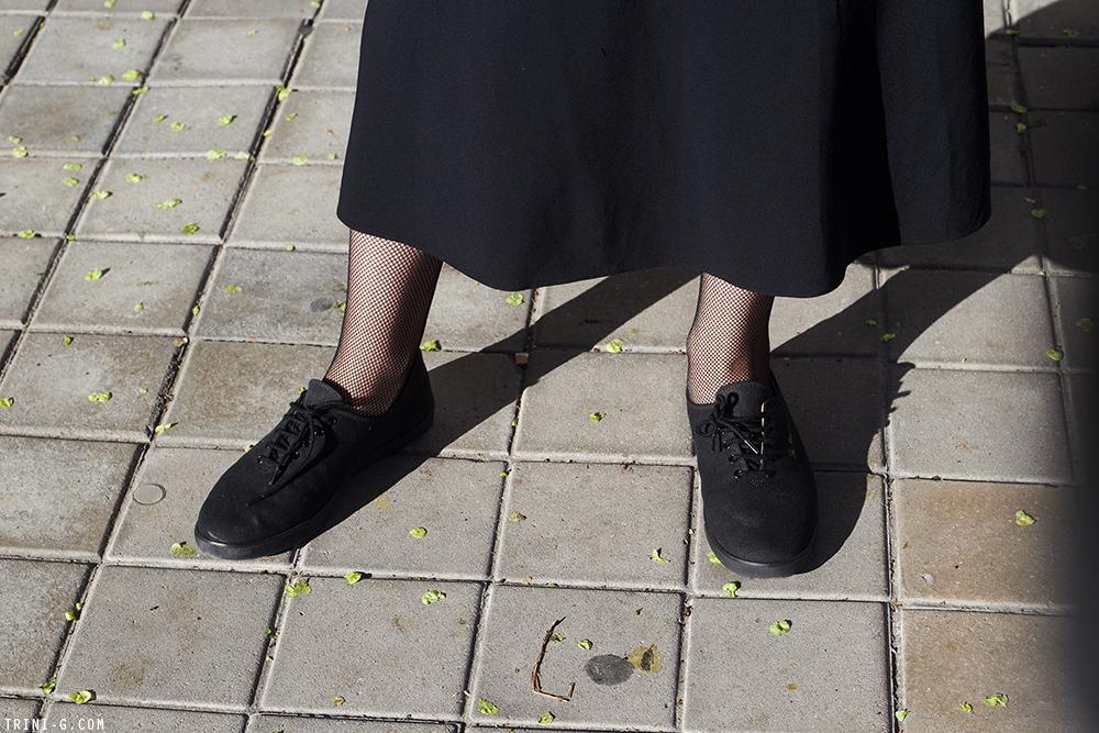 Trini | Acne Studios turtleneck The Row skirt