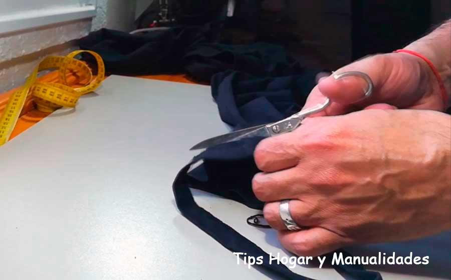 Subir los bajos de un pantalón