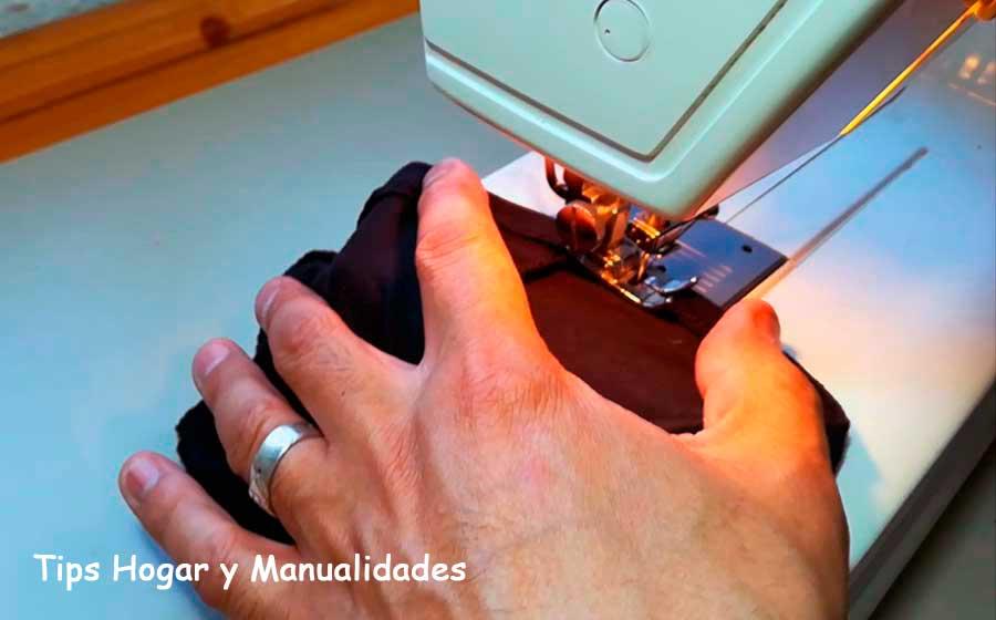 Subir los bajos de un pantalón