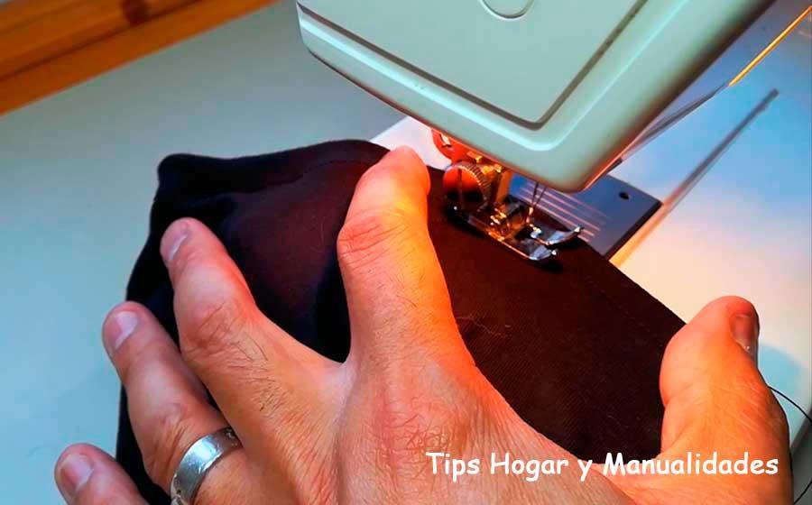 Subir los bajos de un pantalón