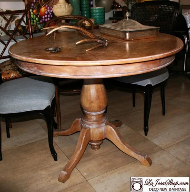 mesa redonda de salon o cocina con pata central