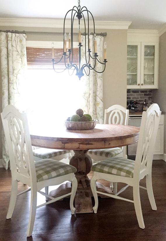 mesa redonda de salon o cocina con pata central