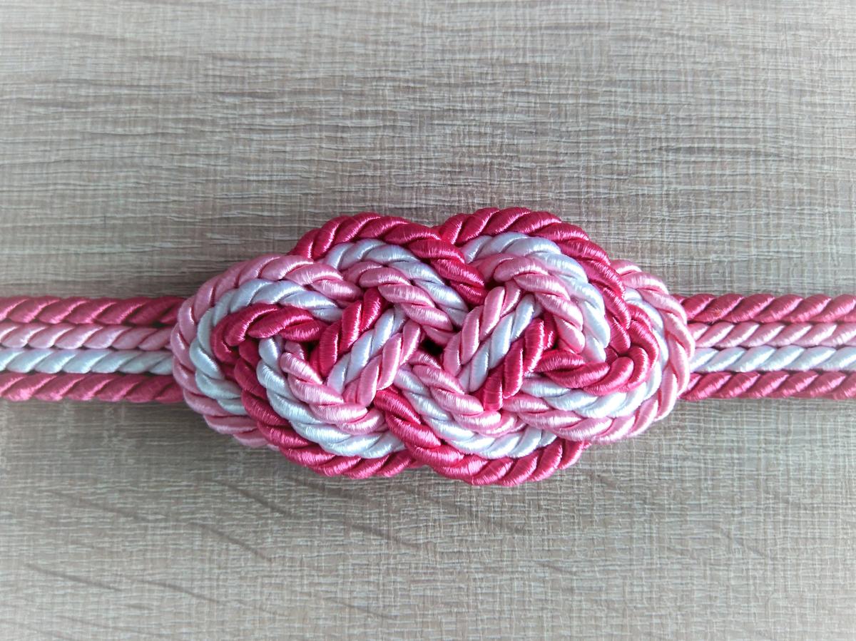 Cinturón con nudo chino de seis puntas (tonos rosados)