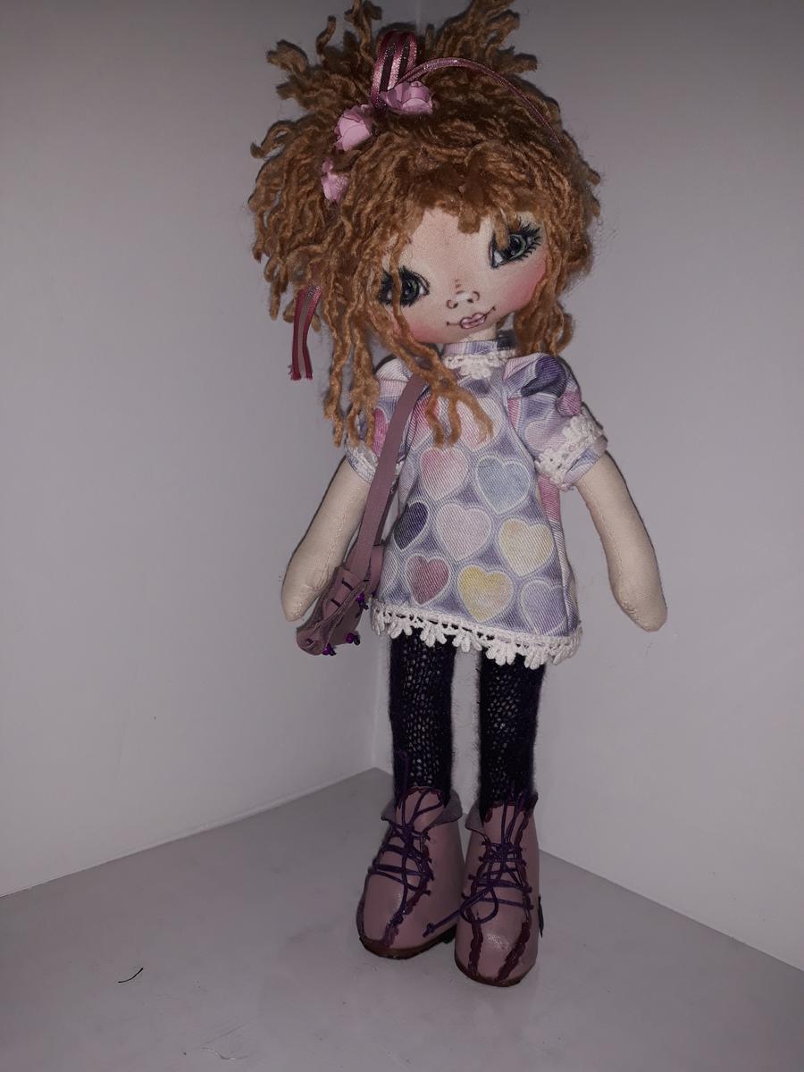 Muñeca de trapo, abrigo rosa