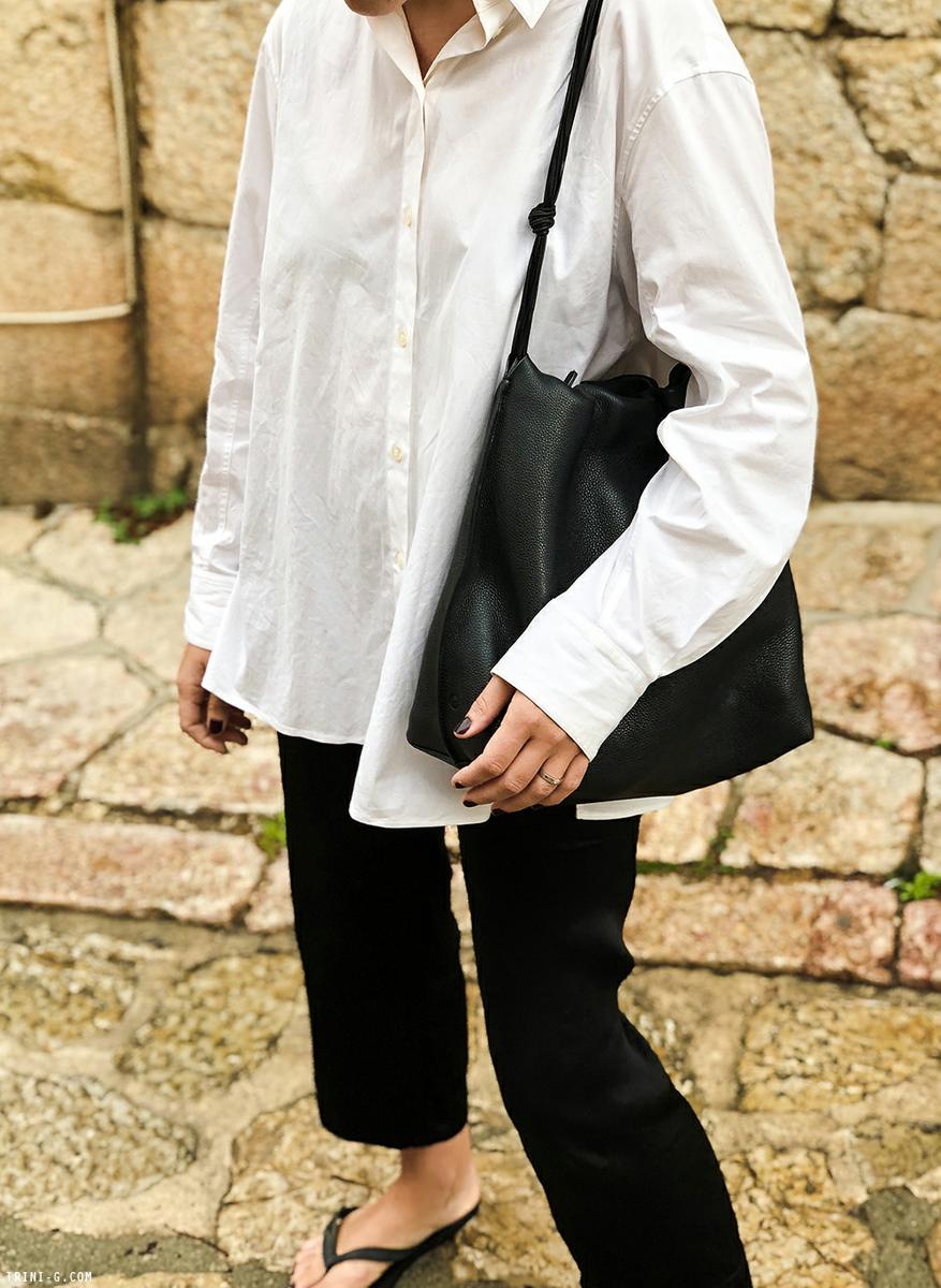 Trini | The Row shirt Havaianas flip flops