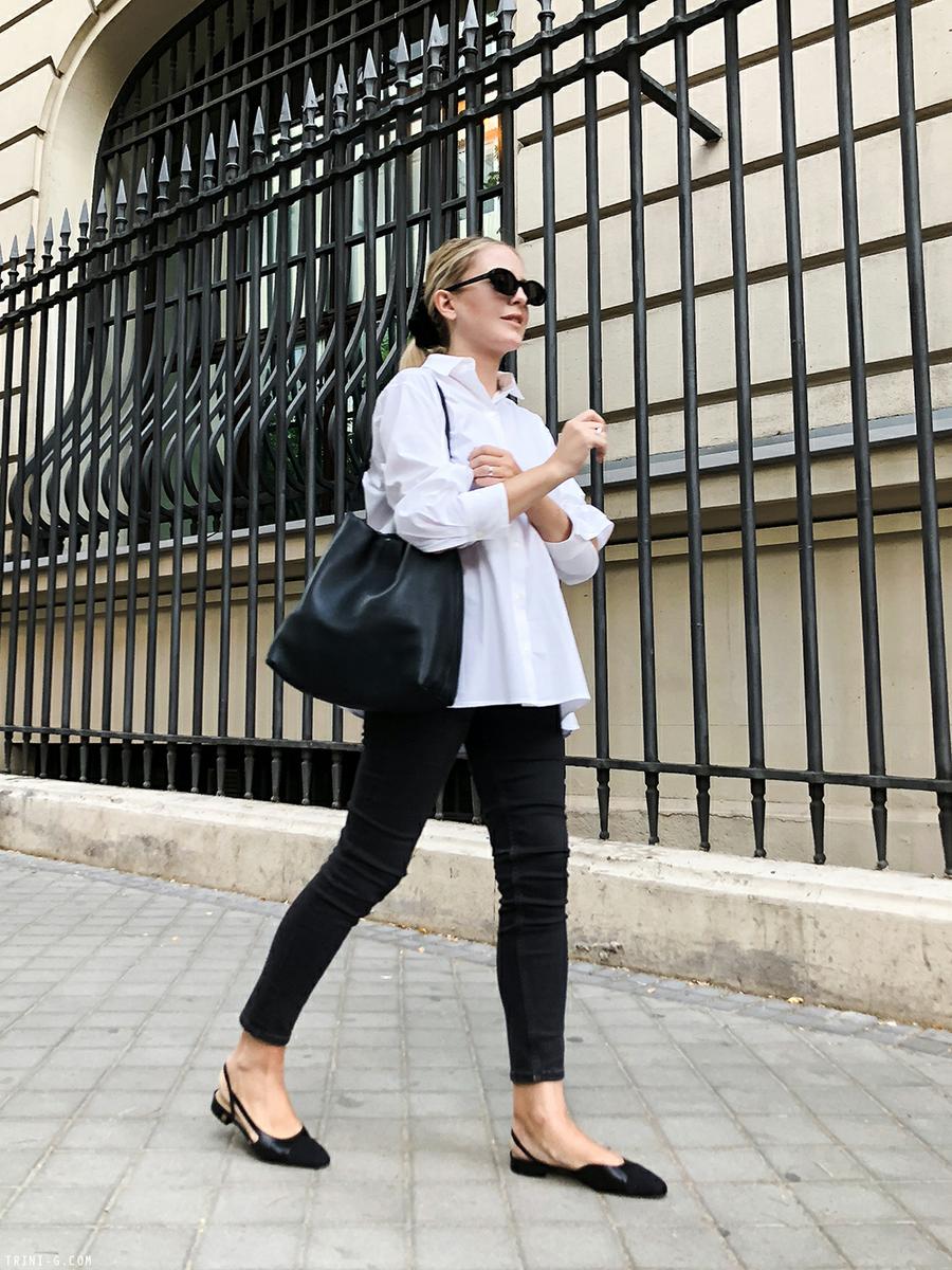 Trini | The Row shirt Balenciaga sunglasses Chanel flat slingbacks