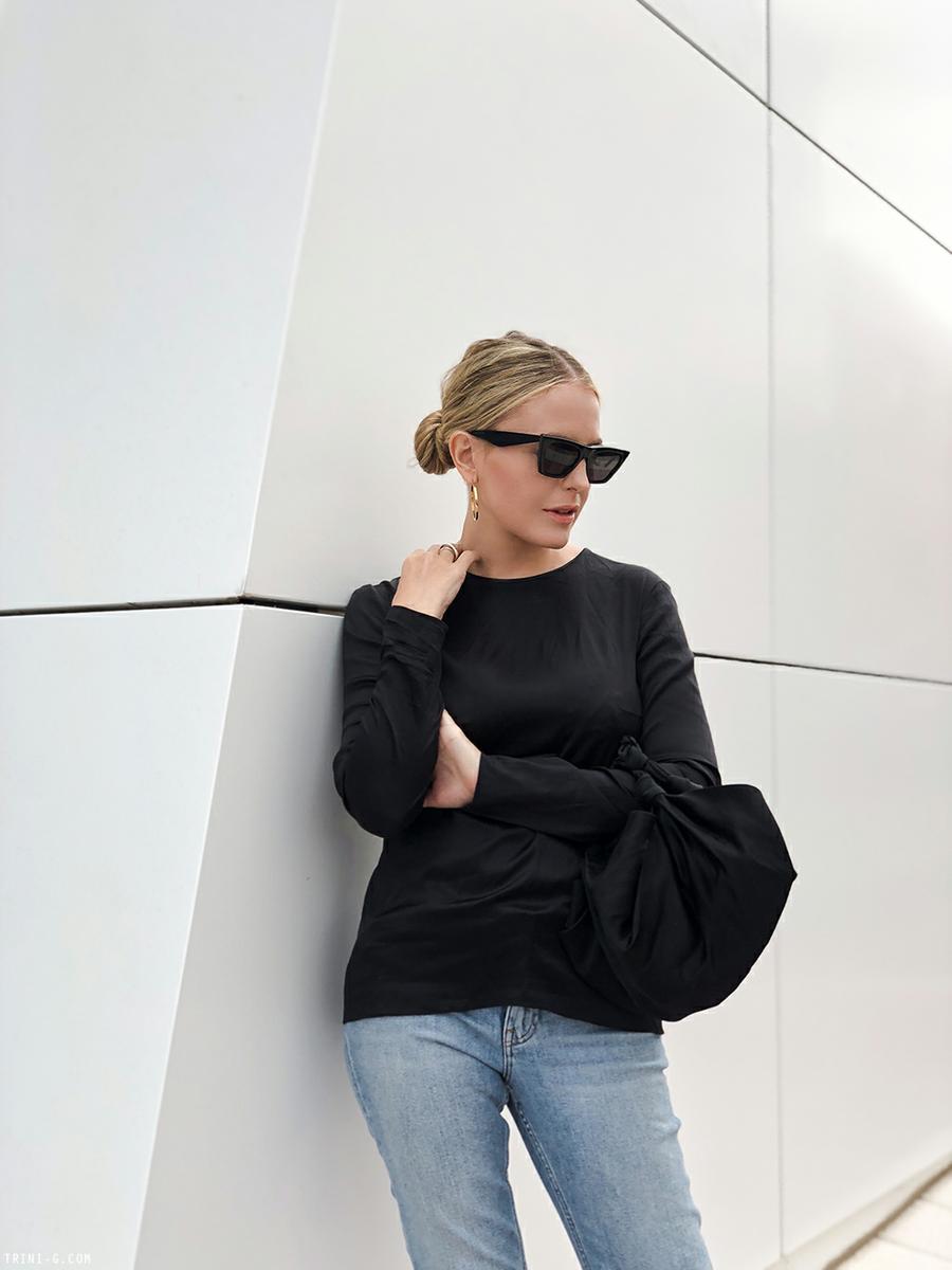 Trini | Acne Studios jeans Deitas top