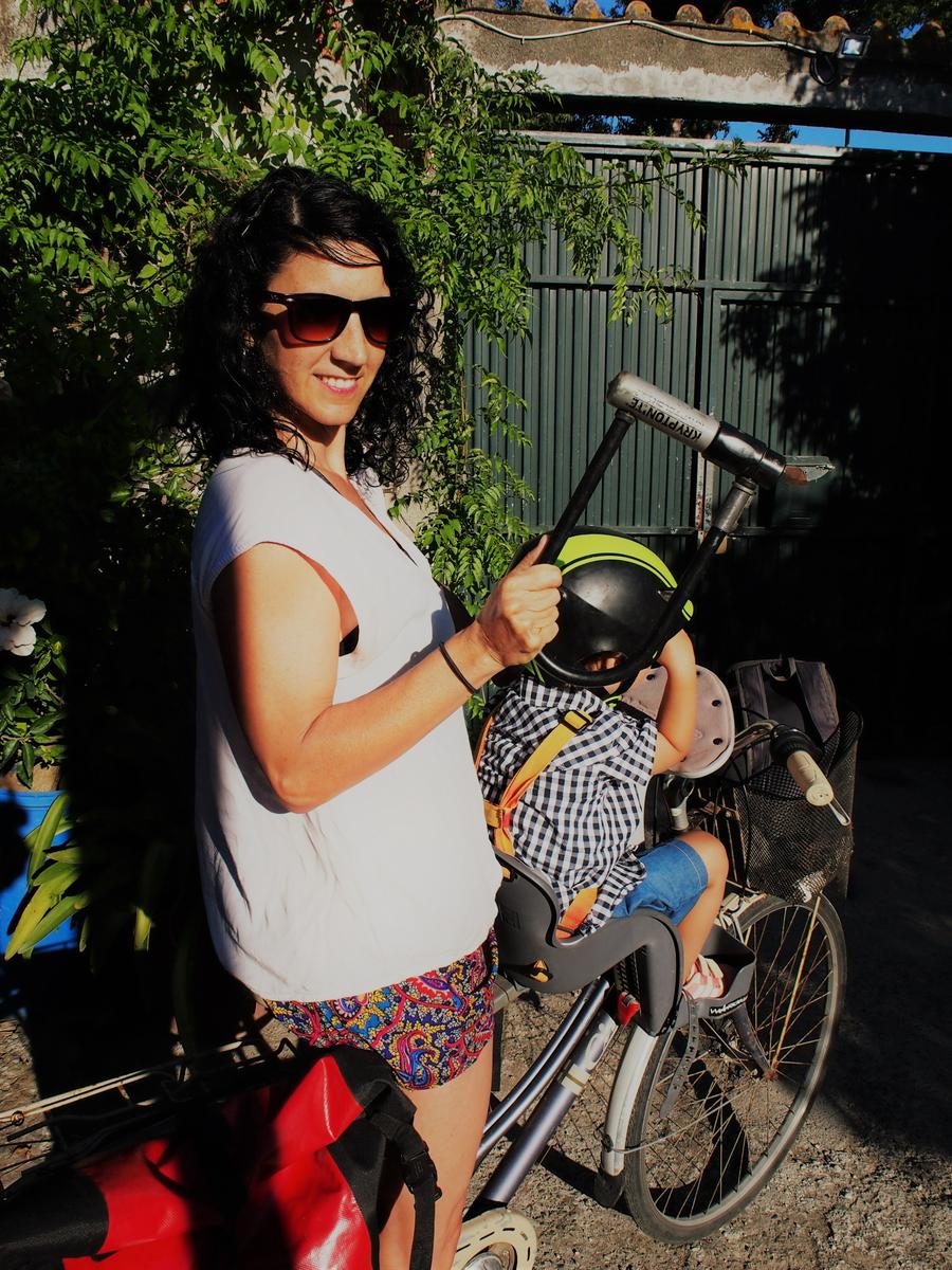 On the bike with lock in hand