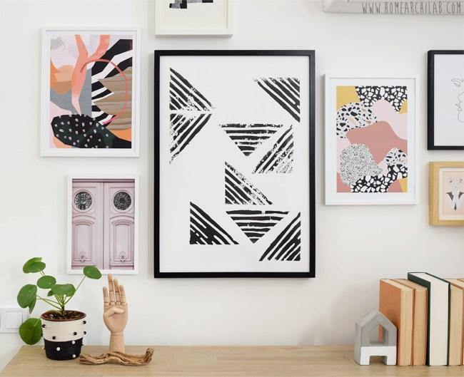 como colgar una composición de cuadros