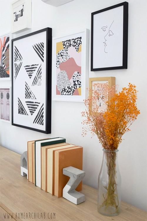 como colgar una composición de cuadros