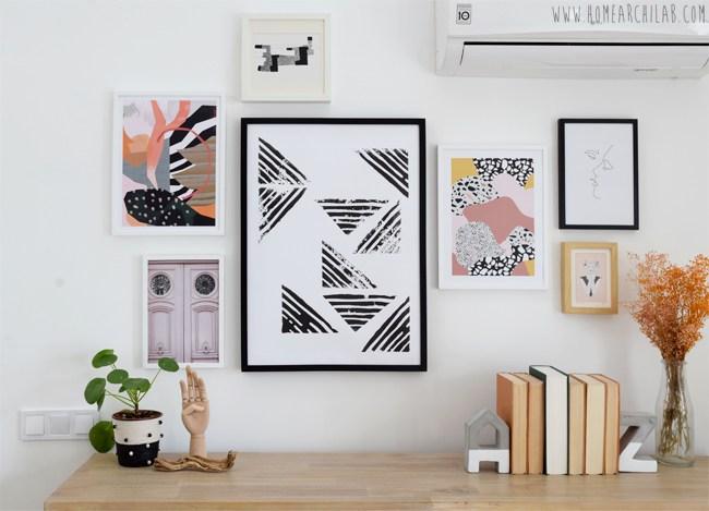 como colgar una composición de cuadros