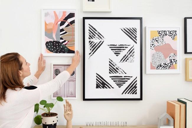 como colgar una composición de cuadros