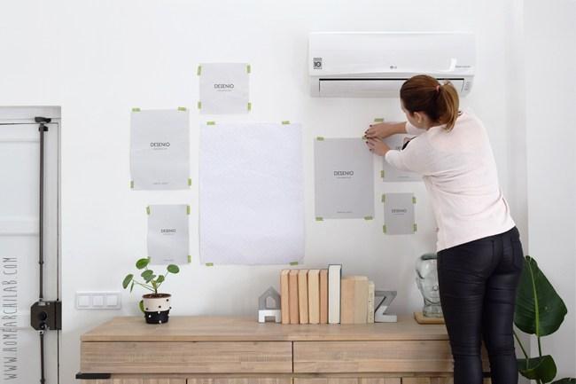 como colgar una composición de cuadros