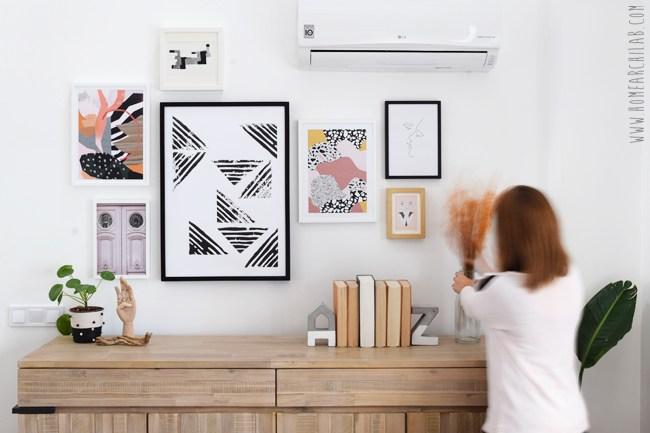 como colgar una composición de cuadros