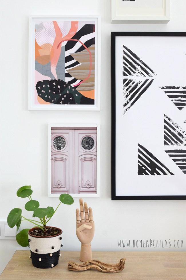 como colgar una composición de cuadros