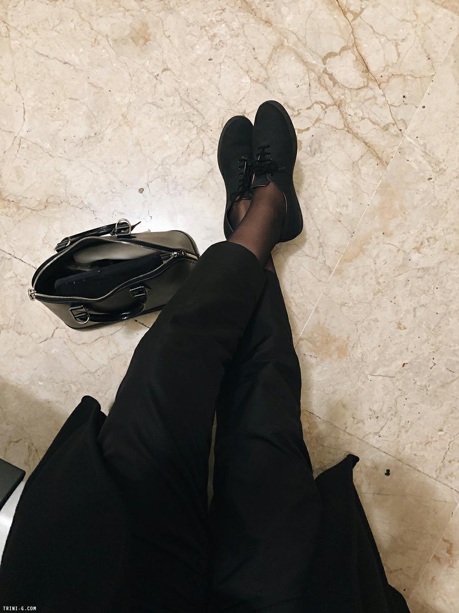 Trini | Prada pants Louis Vuitton Alma bag