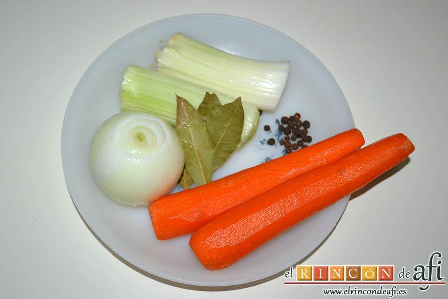 Codillos de cerdo con puré de raíces, pelar las zanahorias, retirar la capa externa de los puerros, lavar el laurel y preparar la pimienta de Jamaica