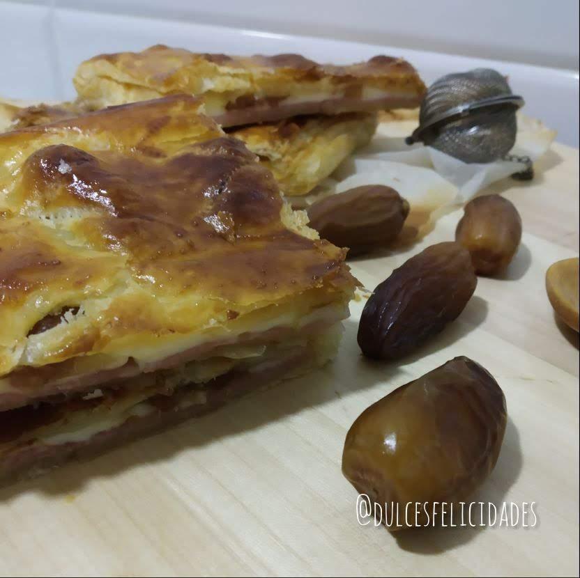 Hojaldre relleno de jamón y queso con dátiles, empanadilla de york y queso 