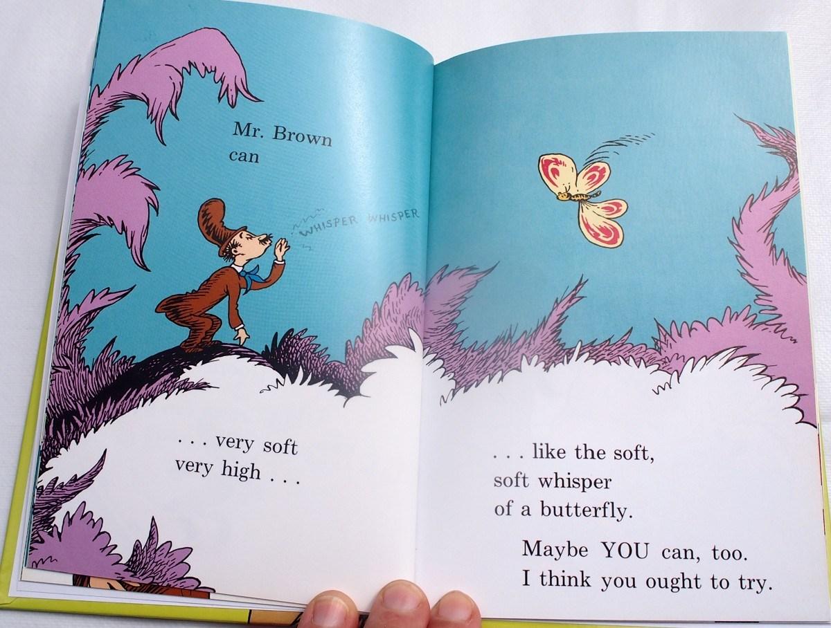 Pagina del oibro Mr Brown can moo donde se le ve murmurando el aleteo de una mariposa