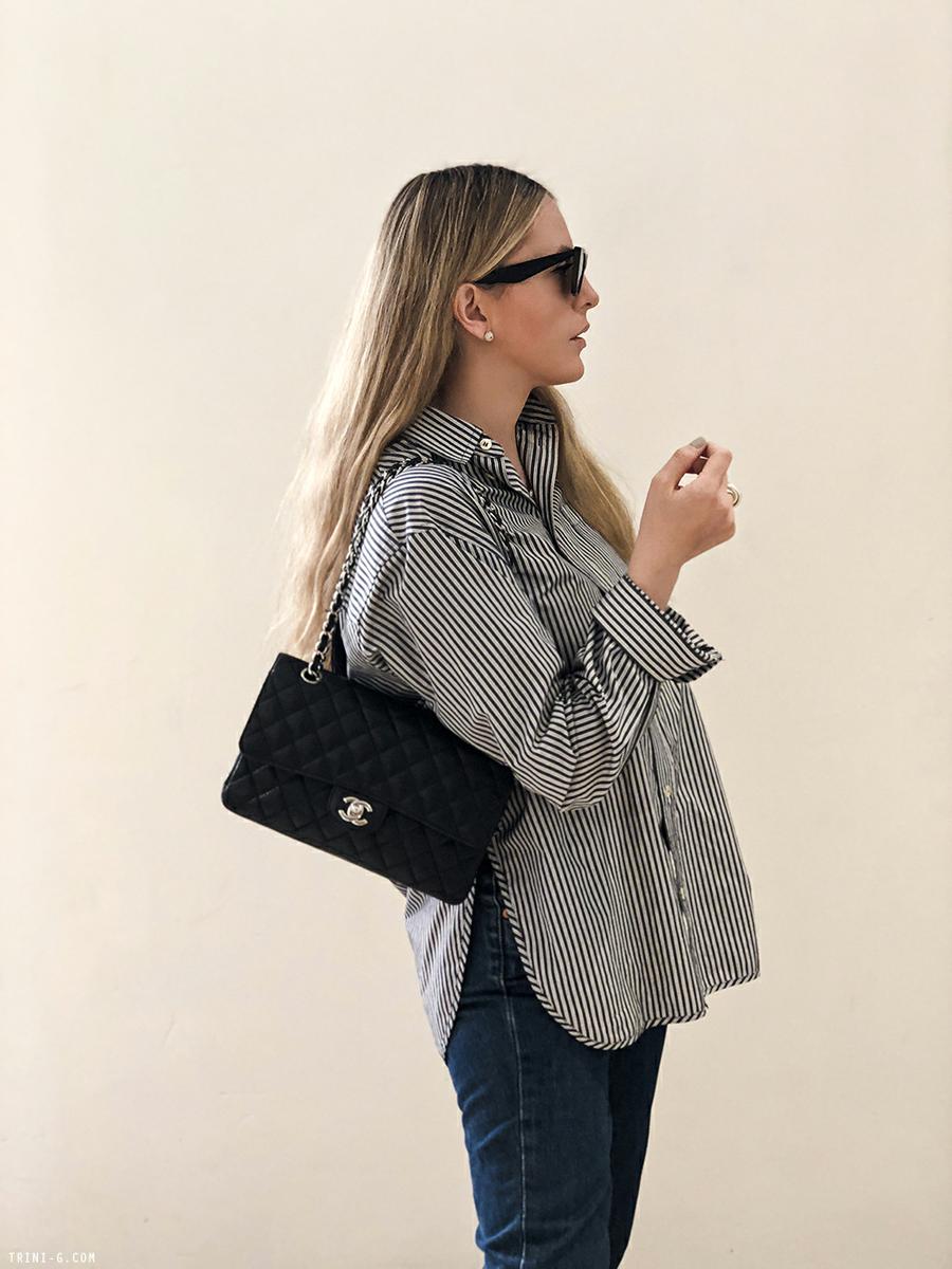 Trini | Levis 501 jeans Balenciaga striped shirt