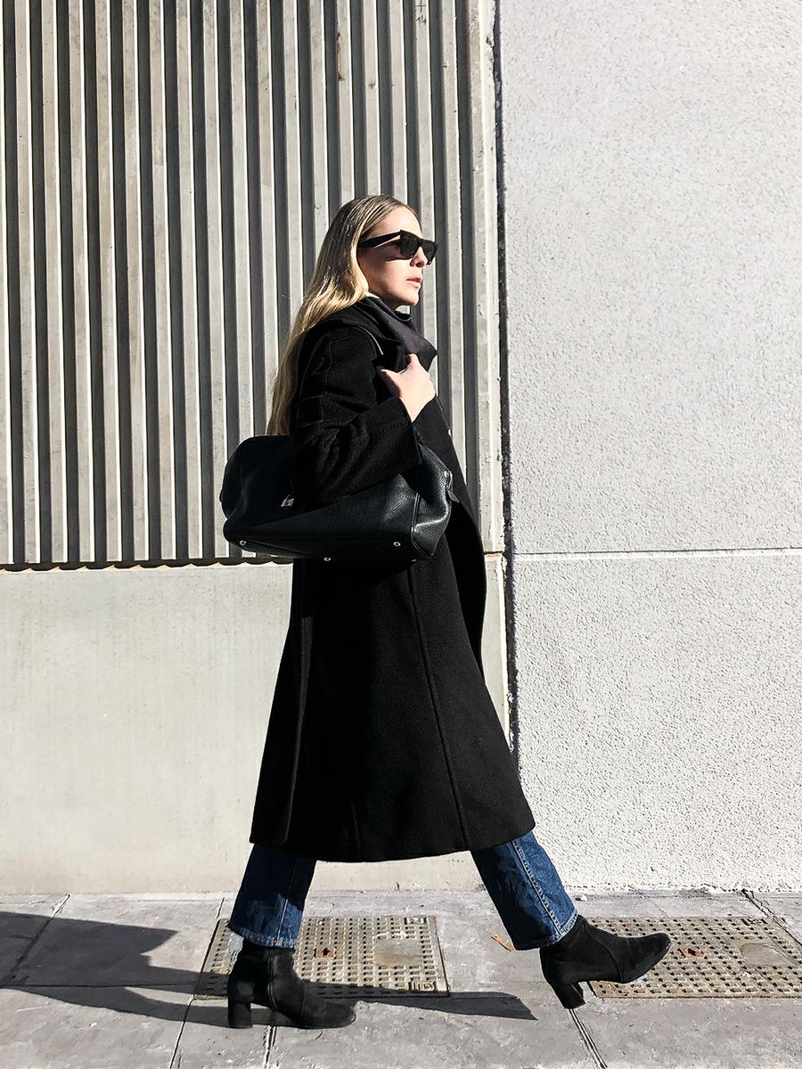 Trini | Max Mara black coat Khaite jeans