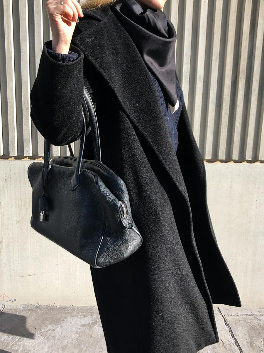 Trini | Max Mara black coat Khaite jeans