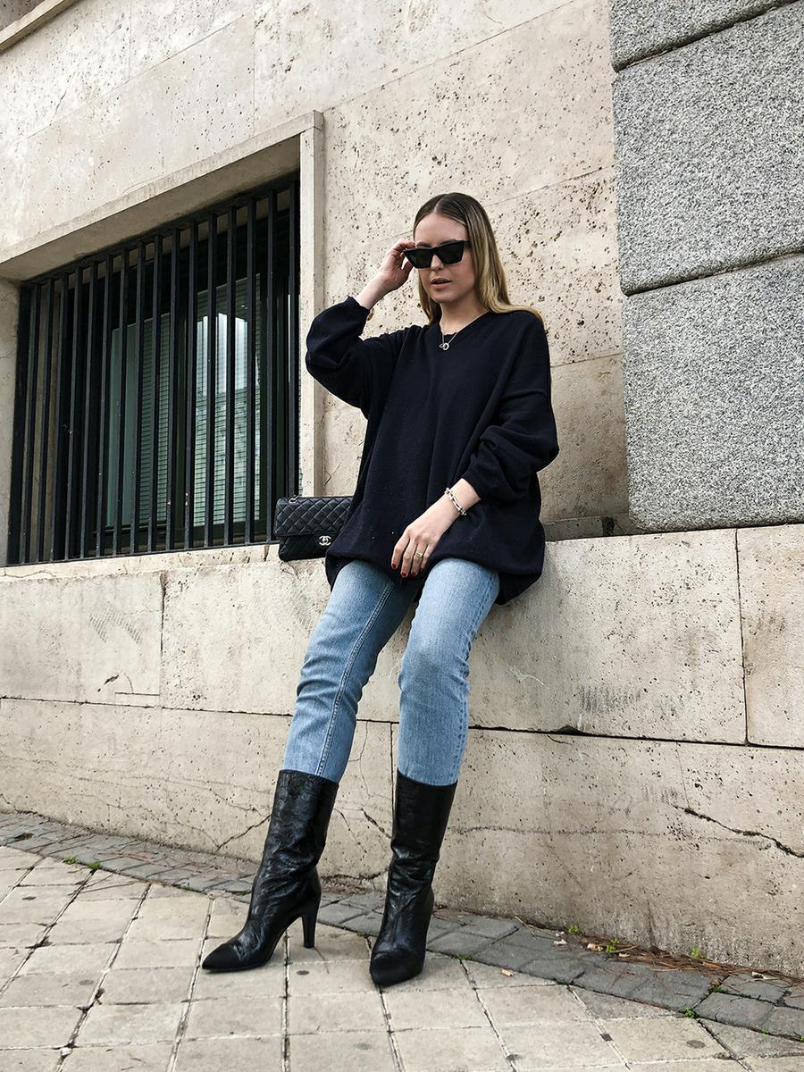 Trini | Loewe sweater Chanel boots