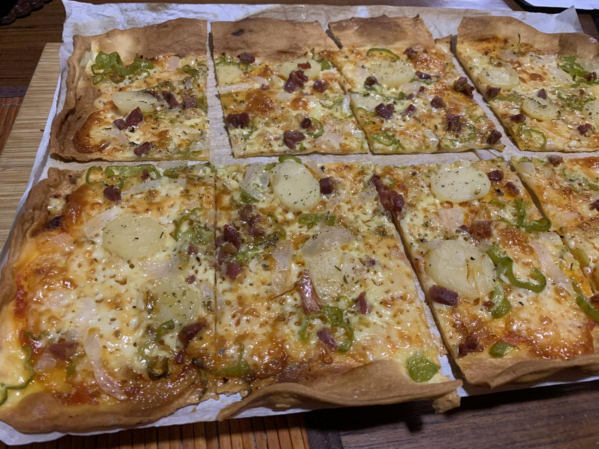 Porciones de Pizza de verdura con jamón y queso