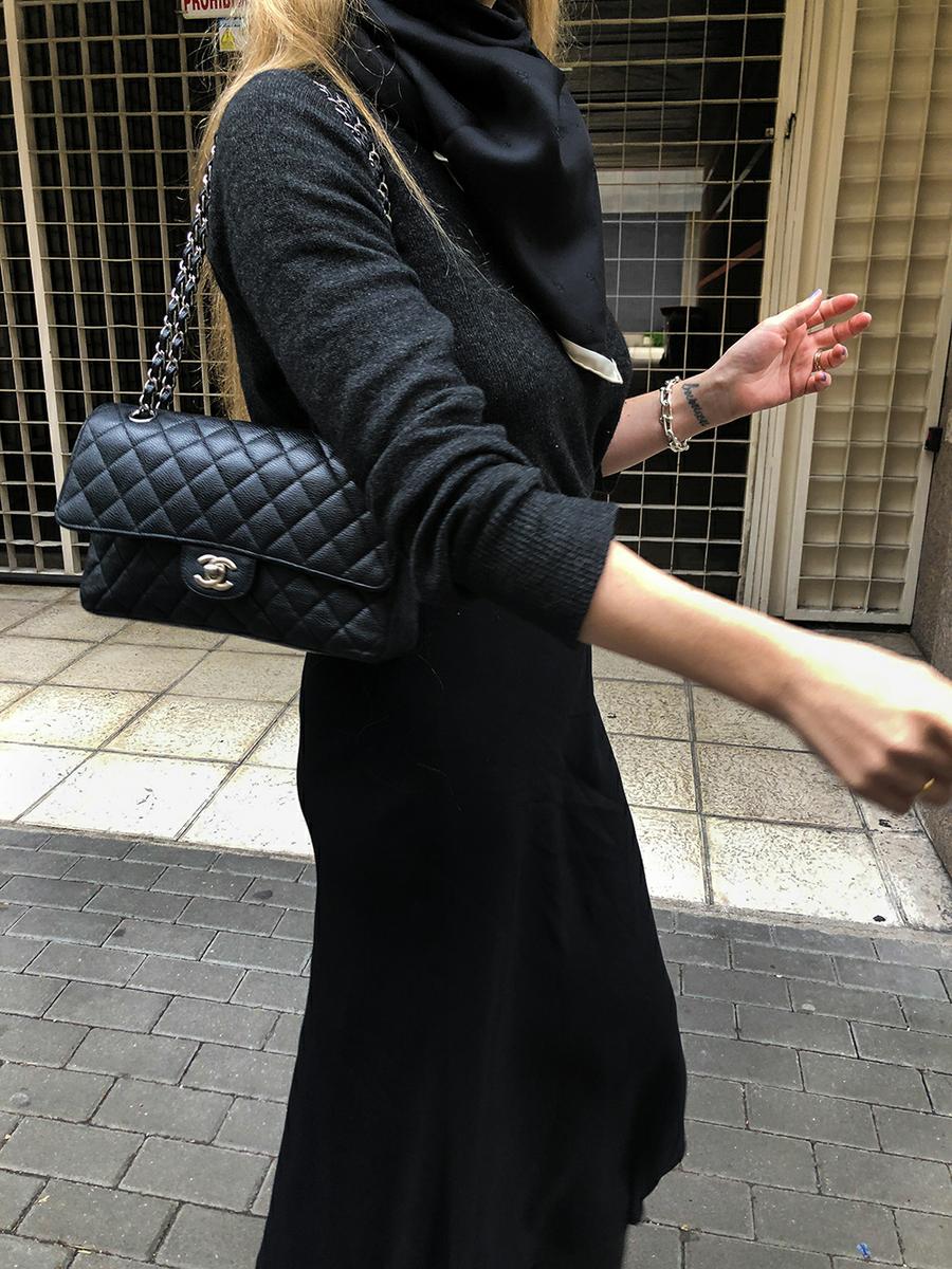 Trini | The Row skirt Chanel boots