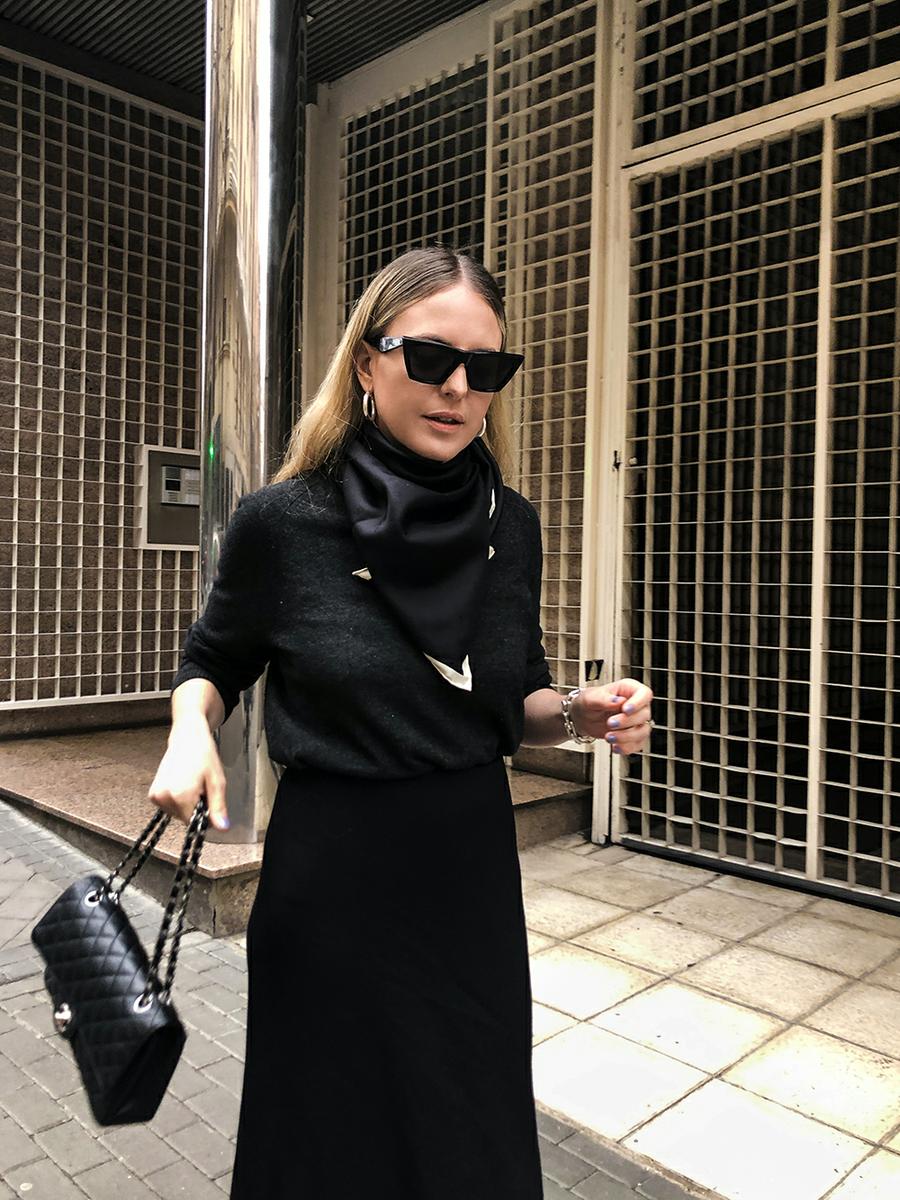 Trini | The Row skirt Chanel boots