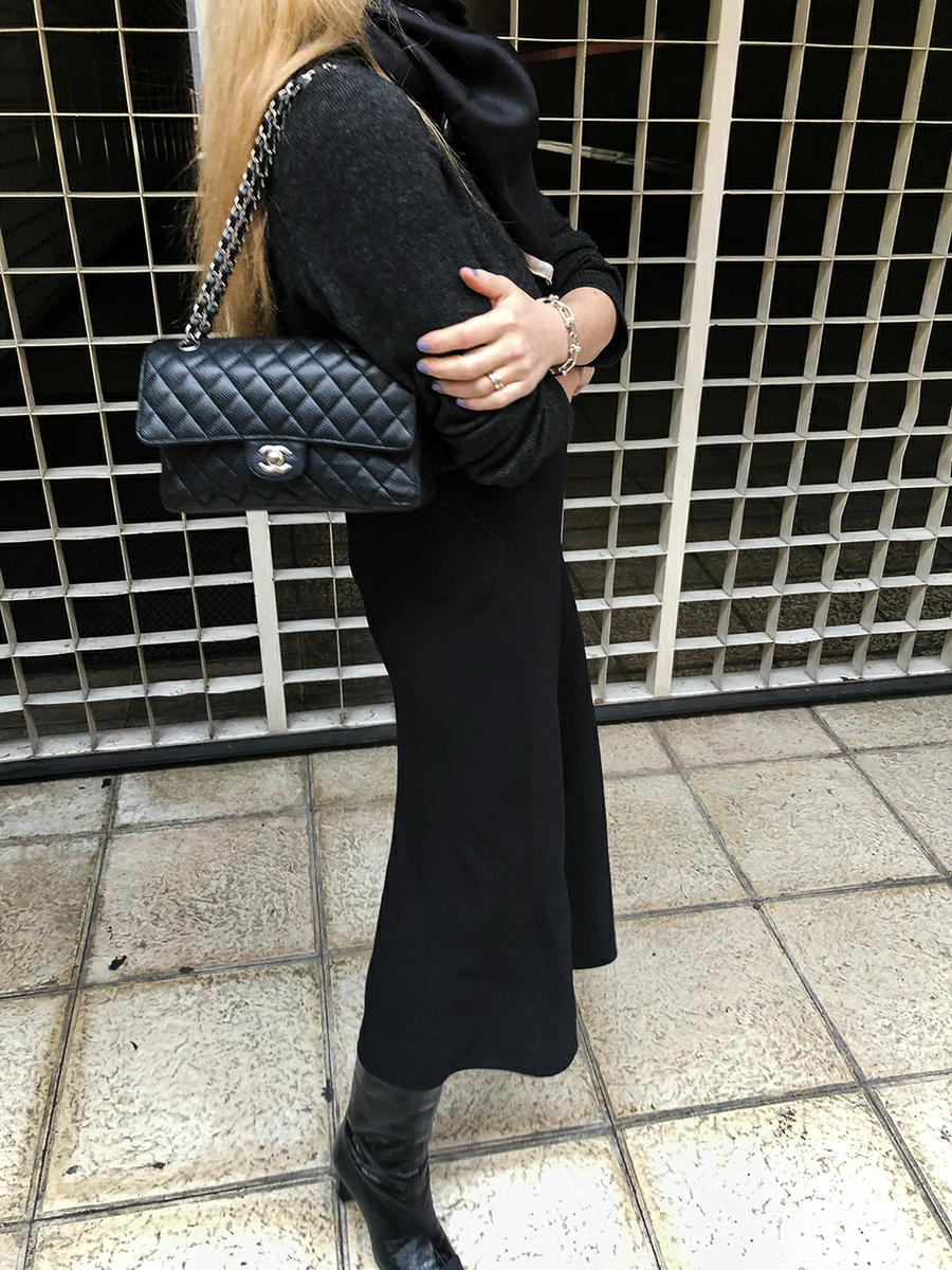 Trini | The Row skirt Chanel boots