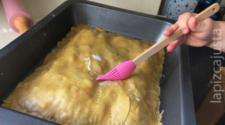 pintar la empanada con leche