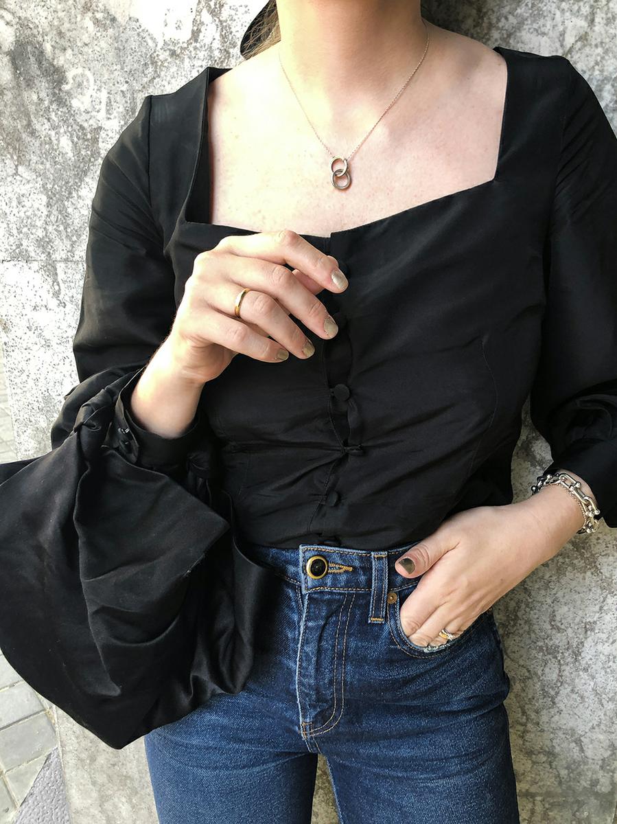 Trini | Khaite jeans Deitas top