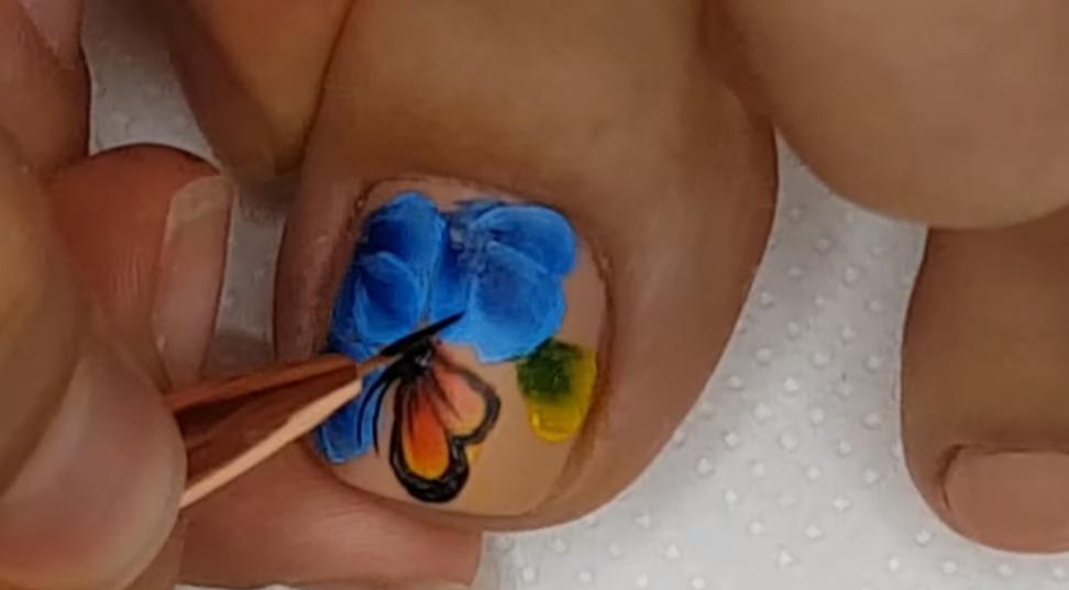 decoración de uñas mariposas y flores fácil