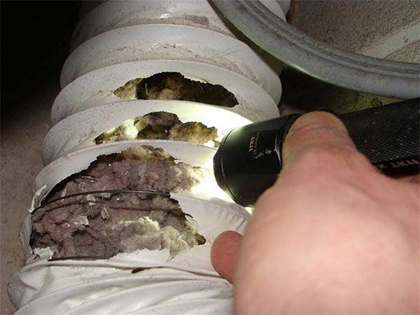 limpiar el tubo de salida de la secadora