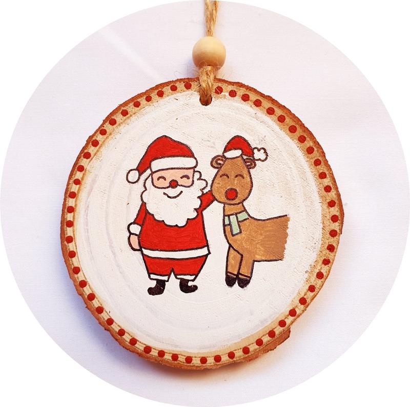 Reno y Papá Noel en rodaja de madera personalizada