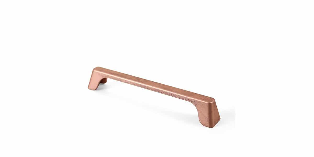 Tirador en tono cobre