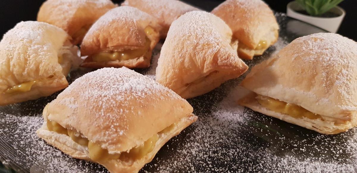 Miguelitos rellenos de crema pastelera