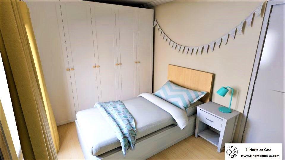 Dormitorio infantil con mucho almacenaje en turquesa y ocre