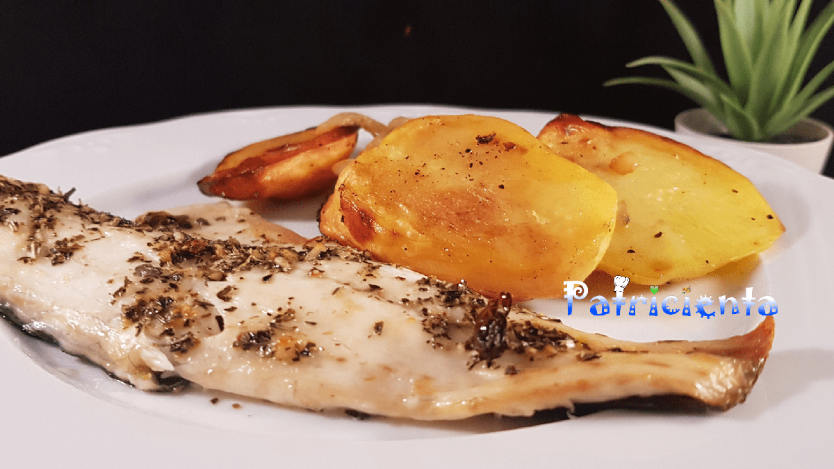 Lubina con patatas a la sidra en horno