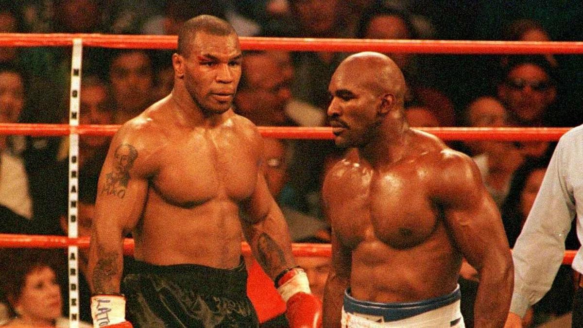 pelea contra holyfield en su biografia en su carrera del boxeo