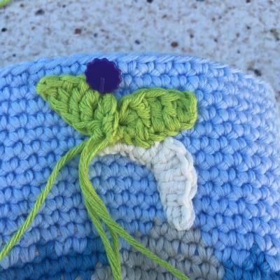 Coser las hojas al monedero crochet isla