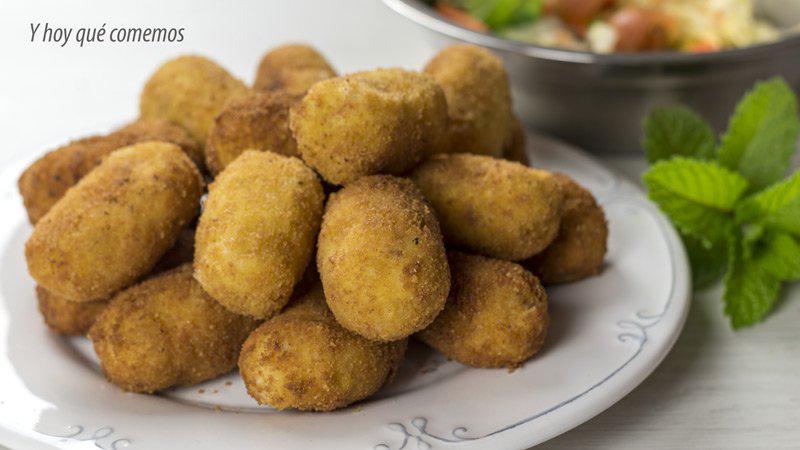 croquetas de merluza y hierbabuena